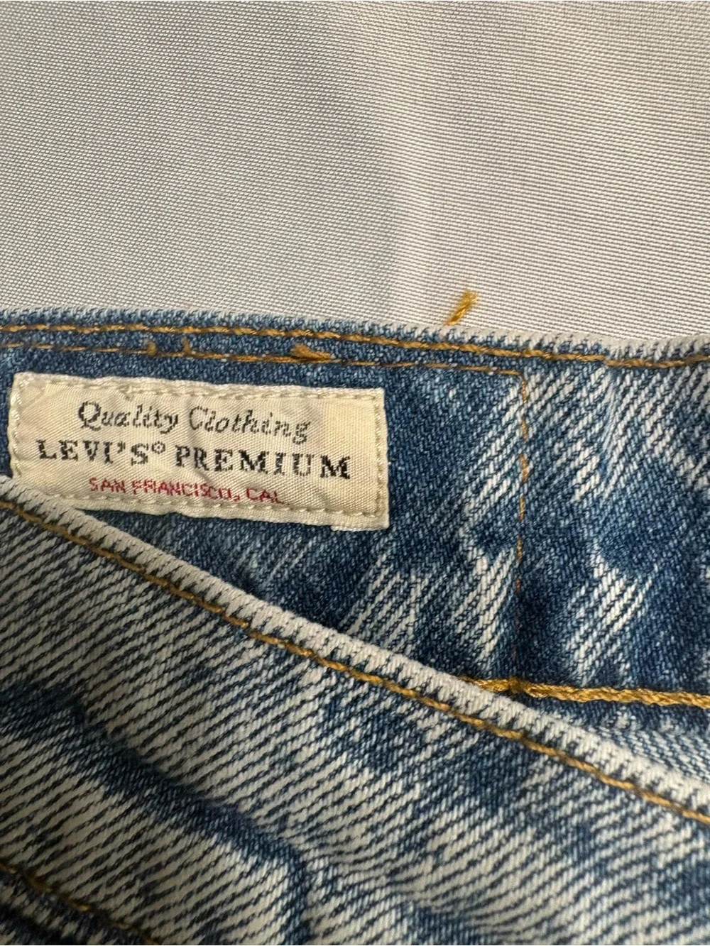Levi's Light Blue Denim Jeans with Red Side Stripes